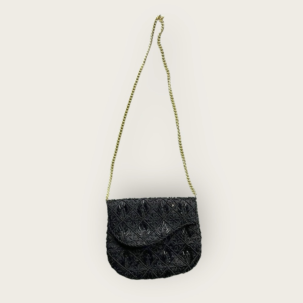 Vintage black beaded purse with gold chain.